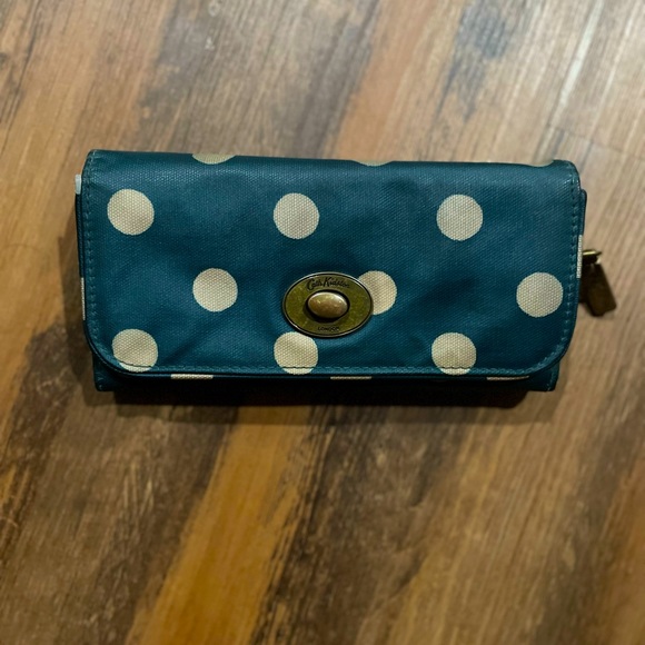 Cath kidston. Bottle green with white polka dot purse for ladies. Used